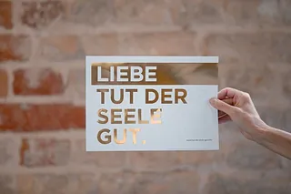  Sign with German text "Liebe tut der Seele gut".